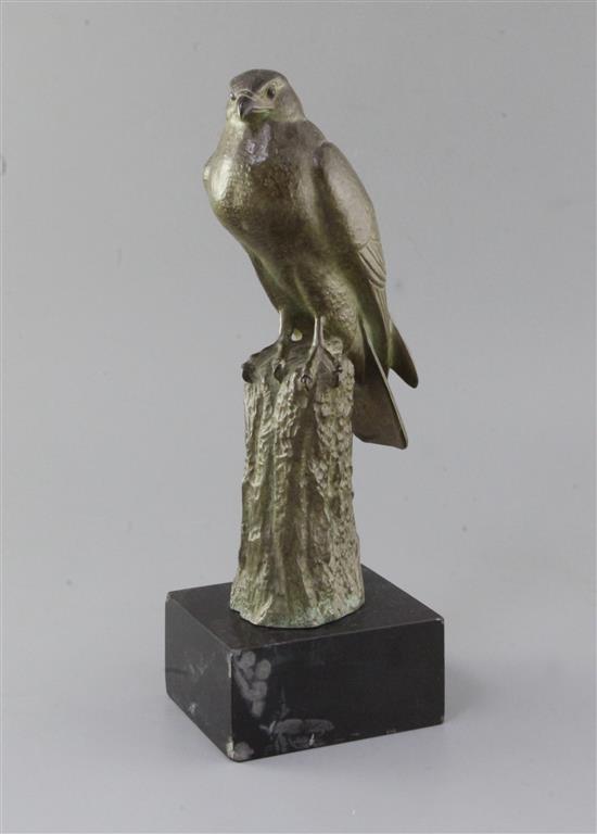 Irénée Rochard (1906-1984). A green patinated bronze model of a falcon perched upon a tree stump, 13.25in.